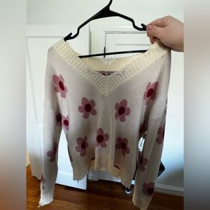 Bailey Rose Floral Distressed Cropped V Neck Sweater Cream Pink
Flowers Medium